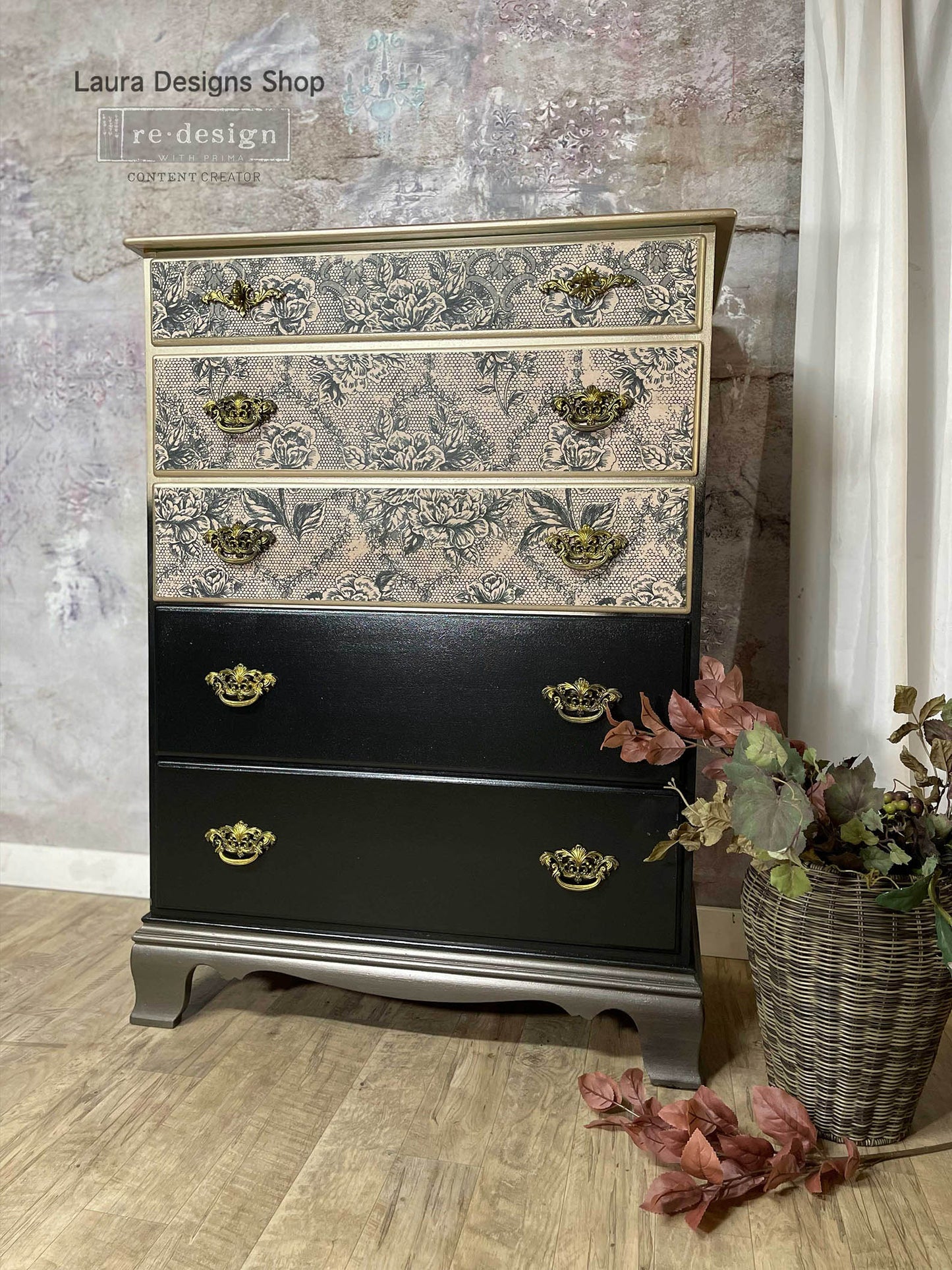 Antique Laces decoupage fiber paper applied to the upper drawers of a tall black dresser with antique gold hardware and metallic trim.