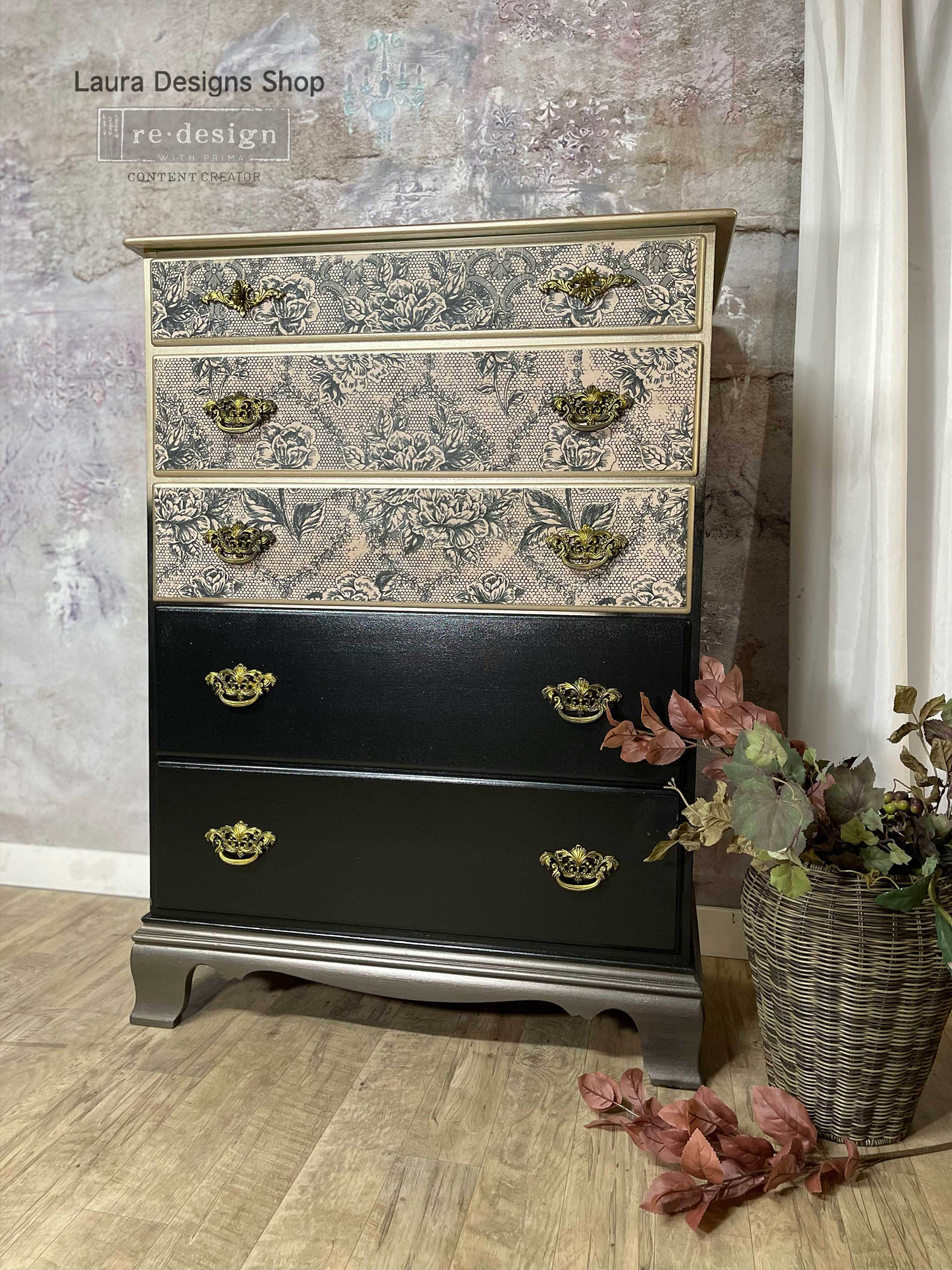 Antique Laces decoupage fiber paper applied to the upper drawers of a tall black dresser with antique gold hardware and metallic trim.