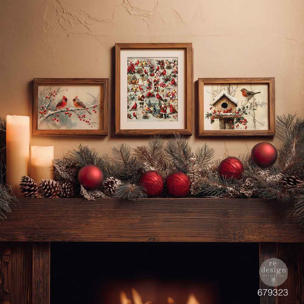 Framed Feathered Elegance Christmas decoupage paper displayed on a wall as holiday artwork featuring winter birds, a snowy birdhouse, red berries, and festive greenery.