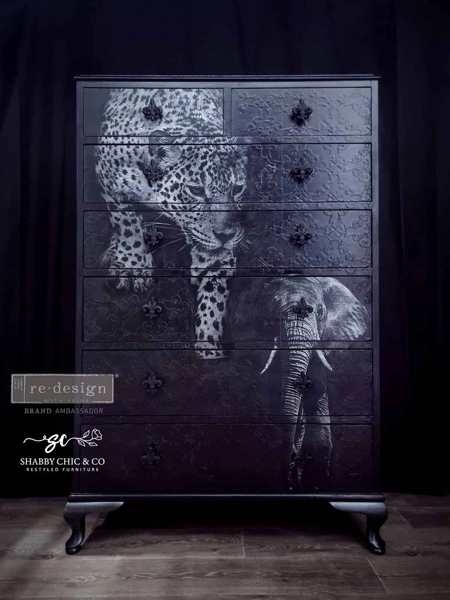 Tall black dresser featuring Feline Gaze leopard decoupage artwork with an elephant accent and dark textured finish.