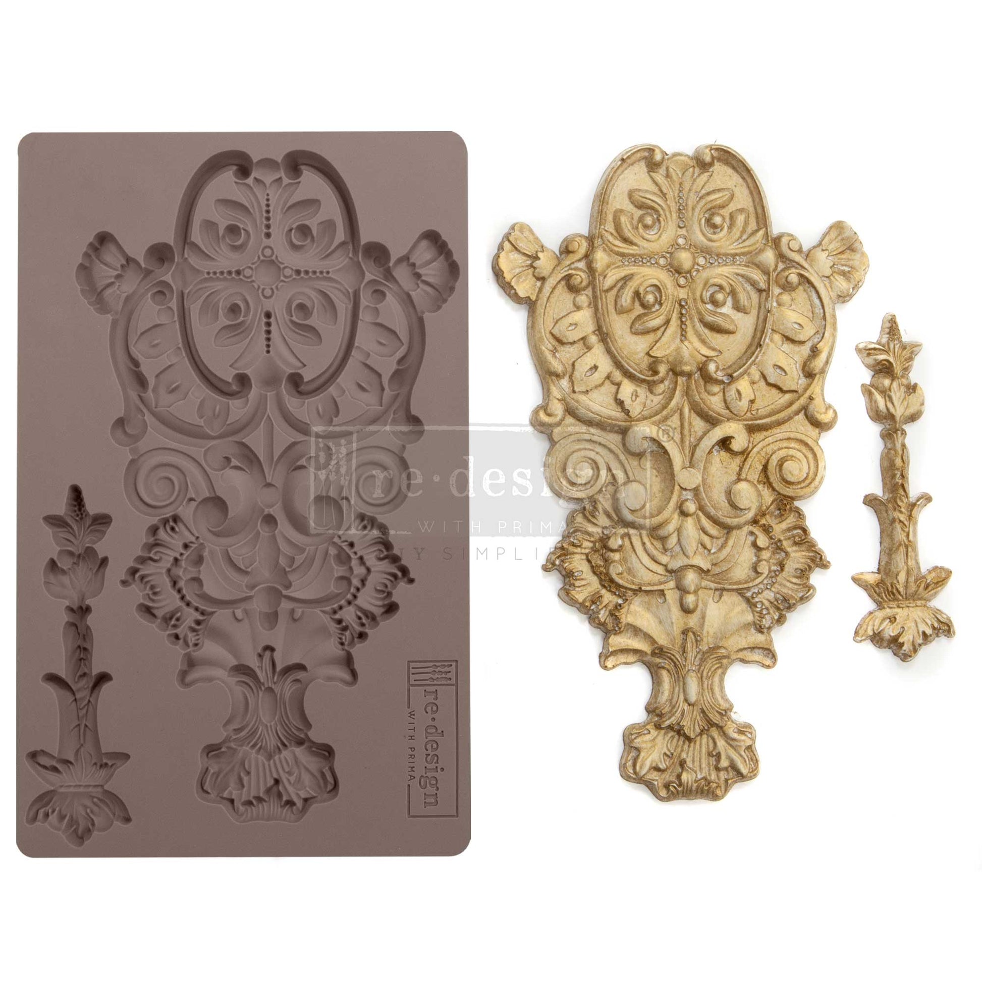 Redesign Décor Moulds Golden Emblem silicone mould with grand vintage-style emblem and decorative floral accent design.