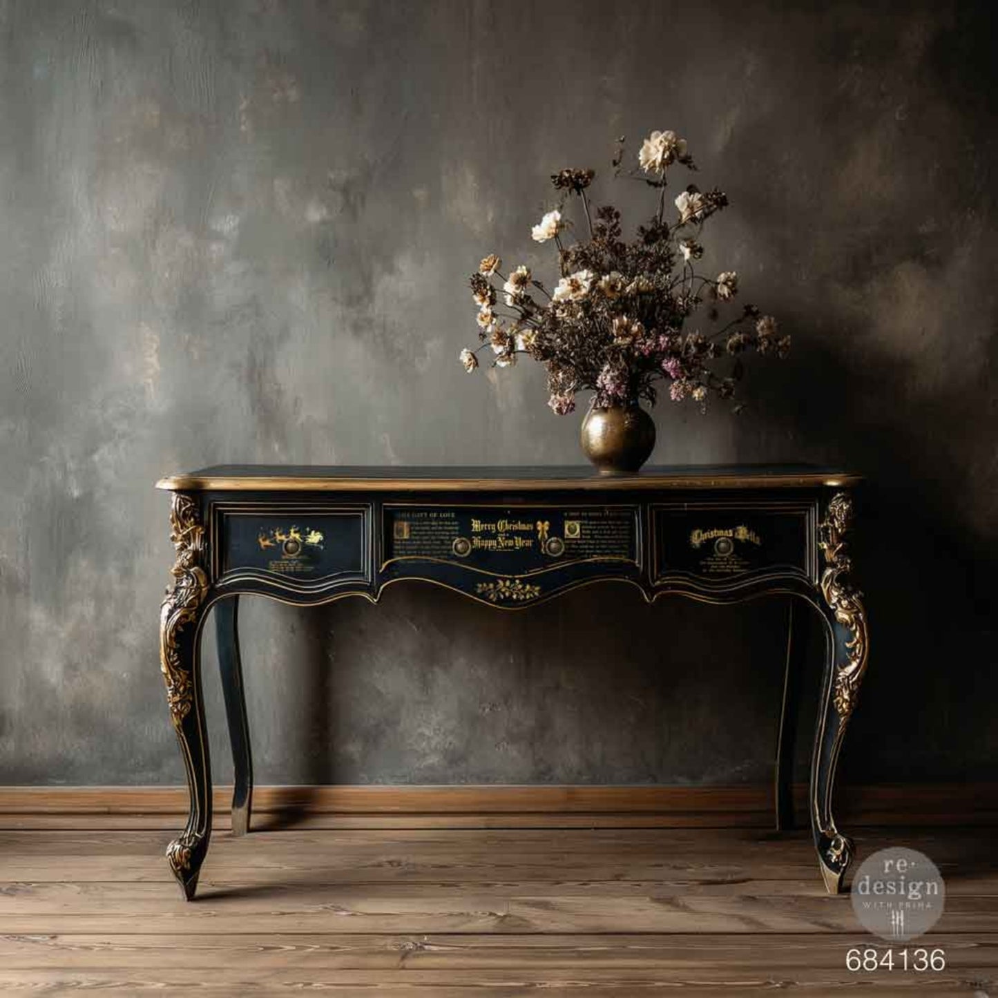 Golden Tidings gold foil Christmas text transfers applied to a black table for a vintage holiday look