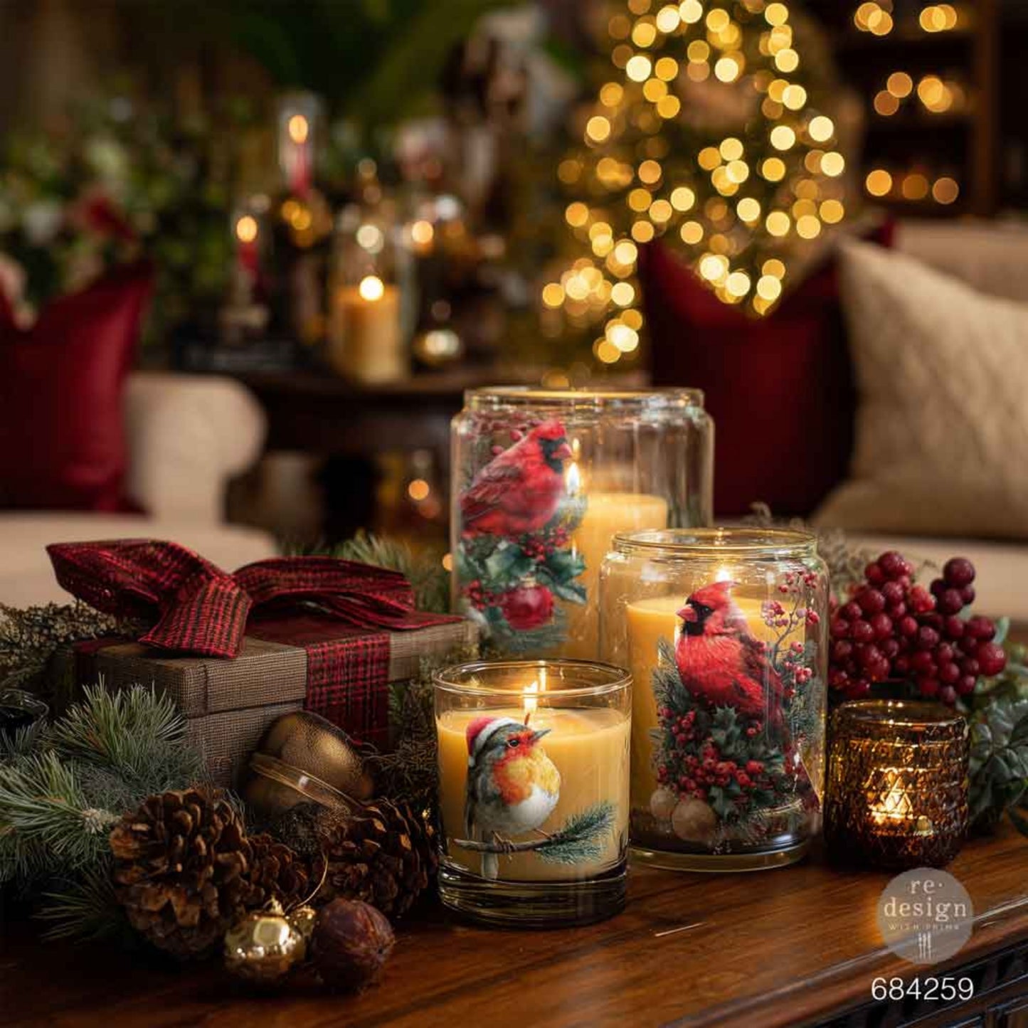 Hollywing Cardinal bird transfers applied to glass candle holders for a festive winter woodland look