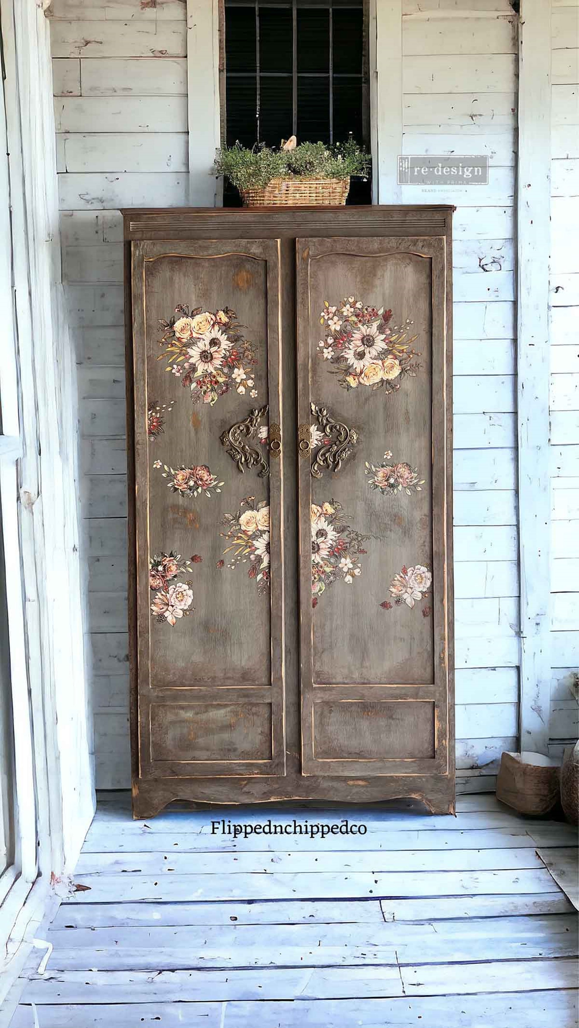 Intricate Grace Décor Poly® appliqués added to the doors of a distressed vintage armoire with floral transfers, creating an ornate romantic furniture makeover.