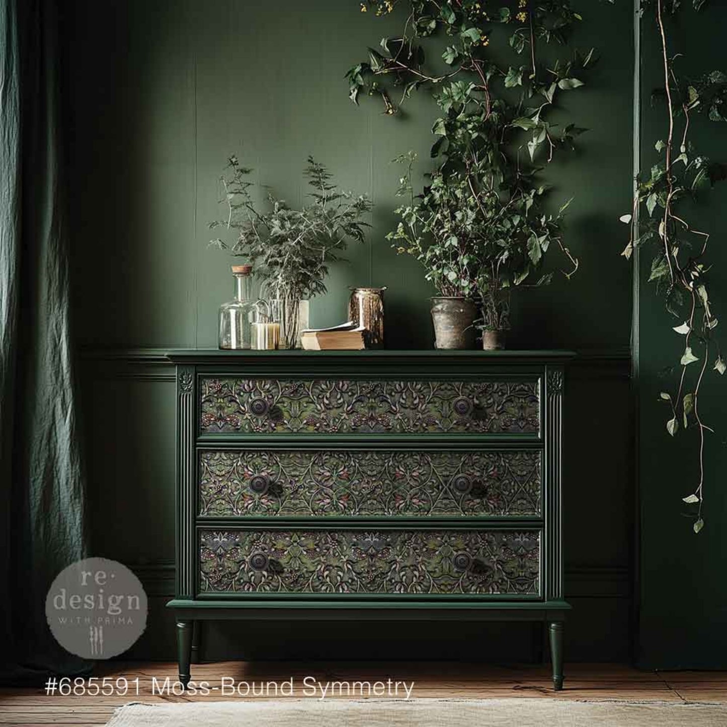 Moss-Bound Symmetry Decoupage Décor Fiber applied to a green dresser, featuring an ornate botanical pattern in moss, gold, plum, and rust tones for a rich vintage furniture makeover.