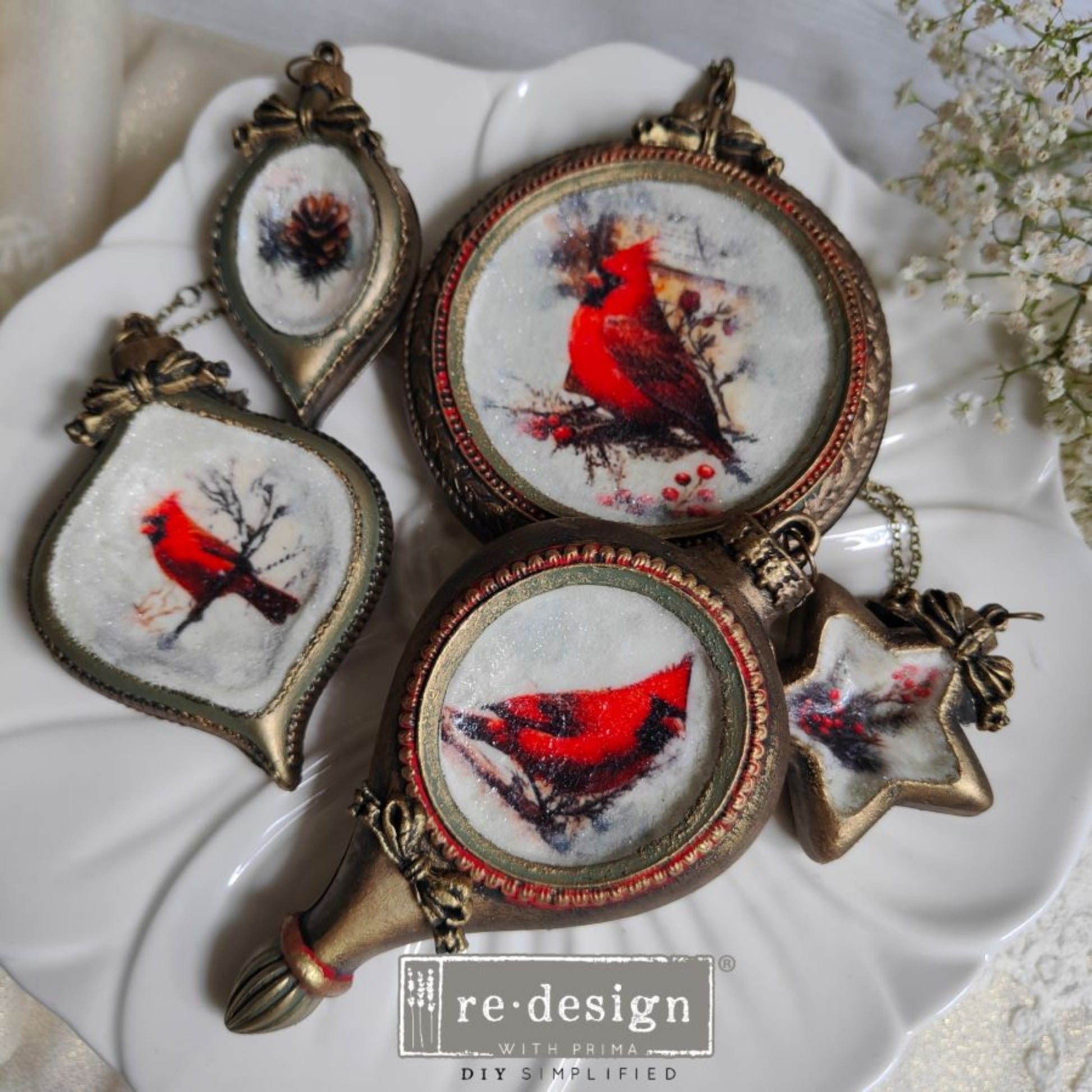 Cardinal ornament sample set
Vintage-style Christmas ornaments featuring red cardinal artwork and snowflake designs, displayed on a white plate.