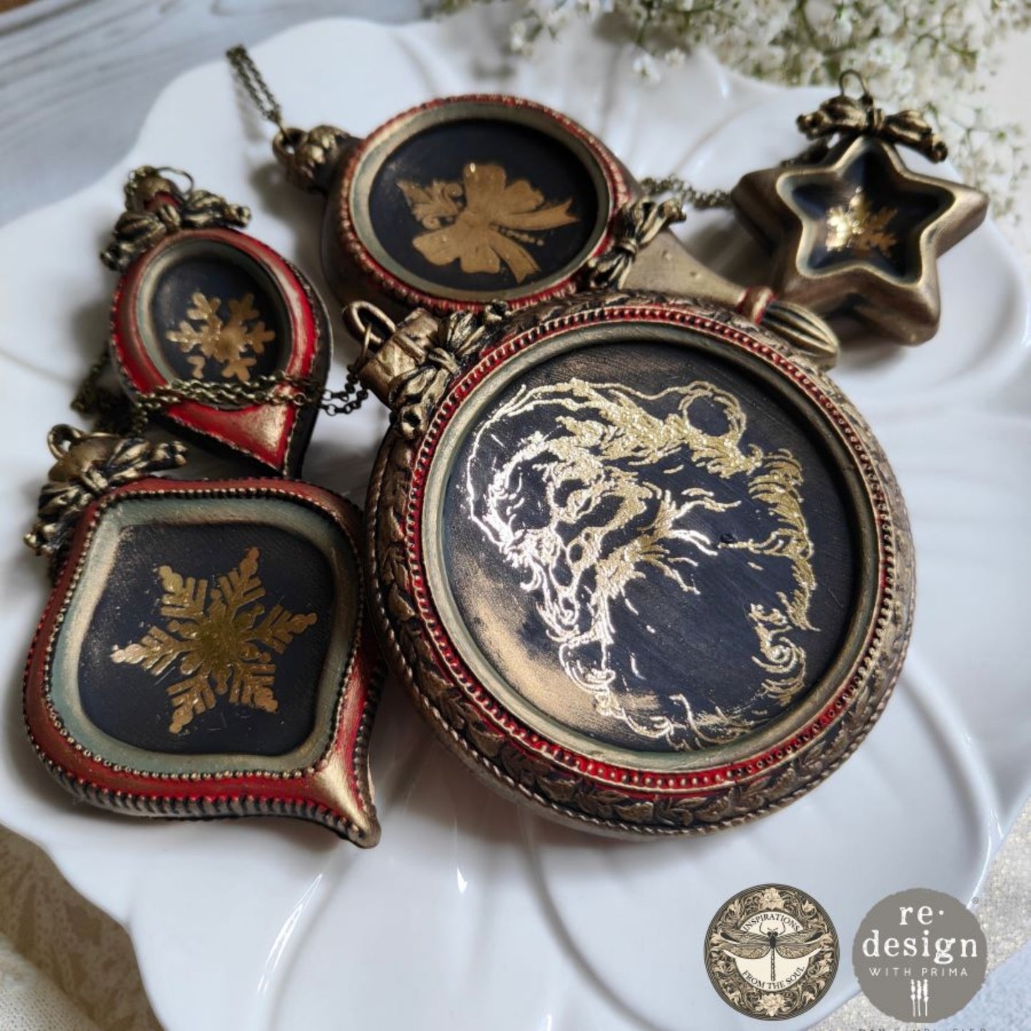 Bronze ornament sample set close view
Bronze-look molded ornaments with gold holiday designs, including Santa and snowflakes, arranged on a white plate.
