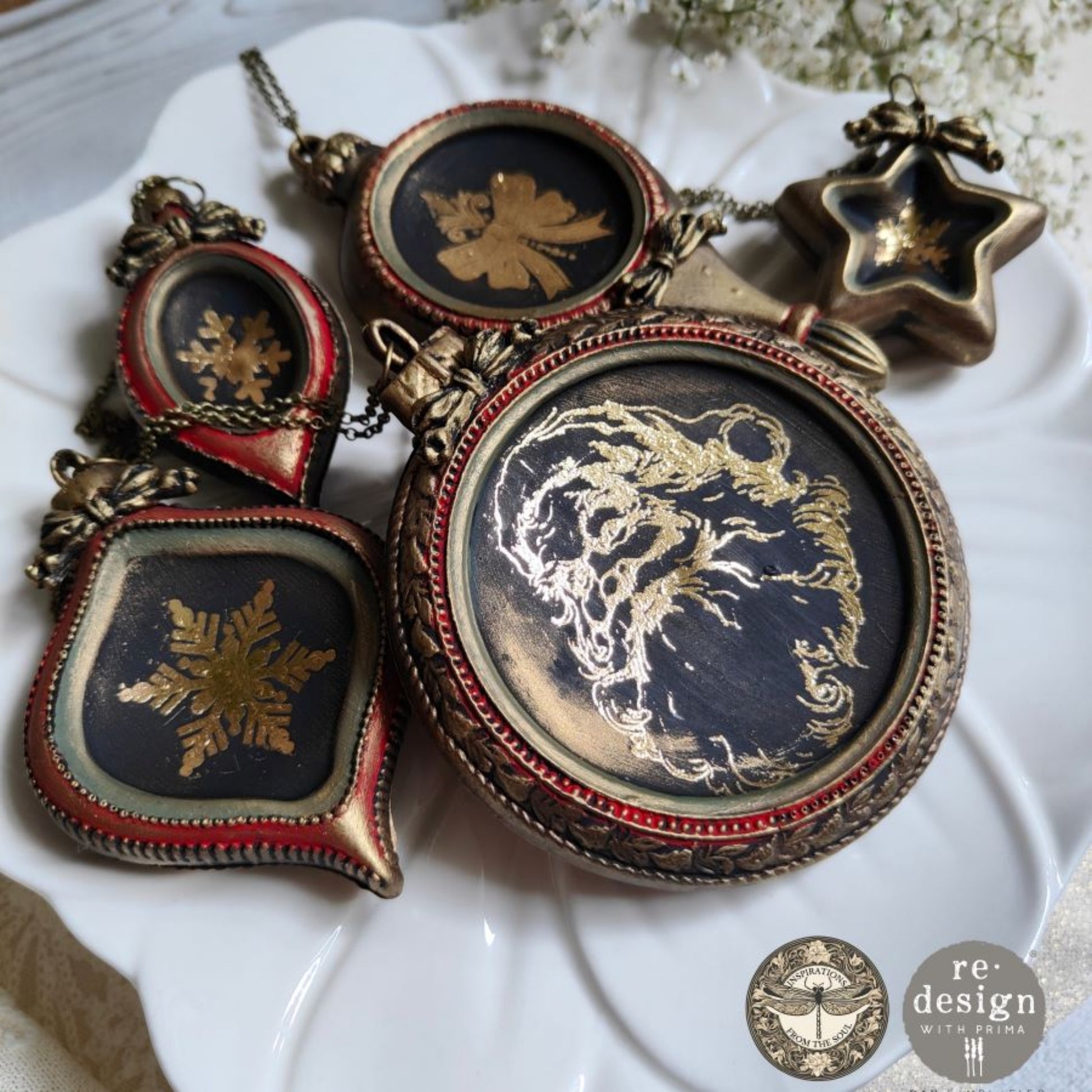 Bronze ornament sample set close view
Bronze-look molded ornaments with gold holiday designs, including Santa and snowflakes, arranged on a white plate.