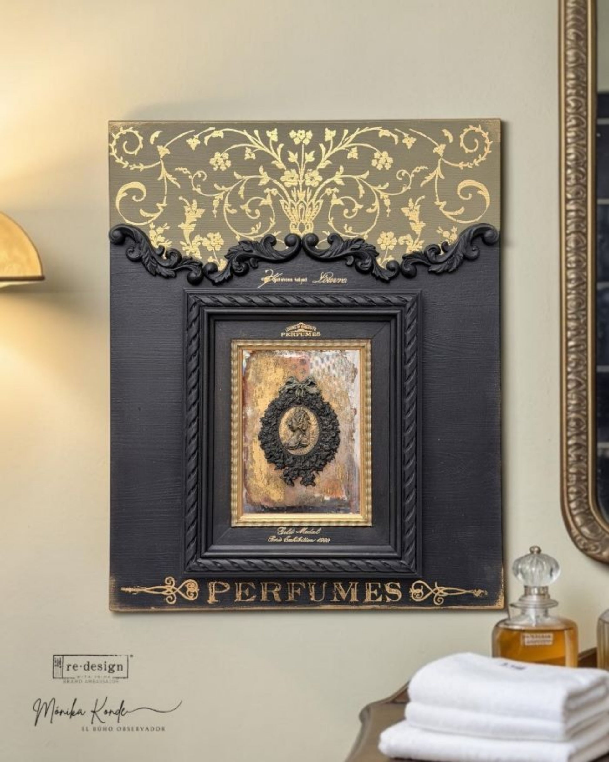 Vintage-style castings from the Ombres Florales Decor Mould with antique gold cameo, decorative frames, cherubs, and floral accents.