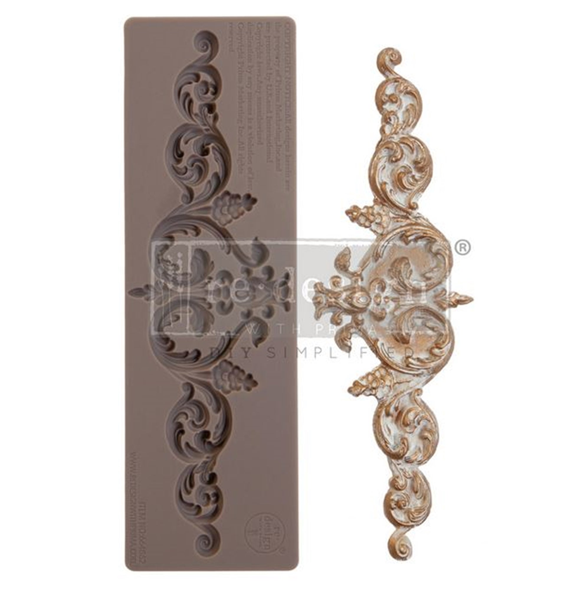 Ornate Remi scroll embellishment sample showing raised baroque details, curved flourishes, and distressed gold finish for décor projects.