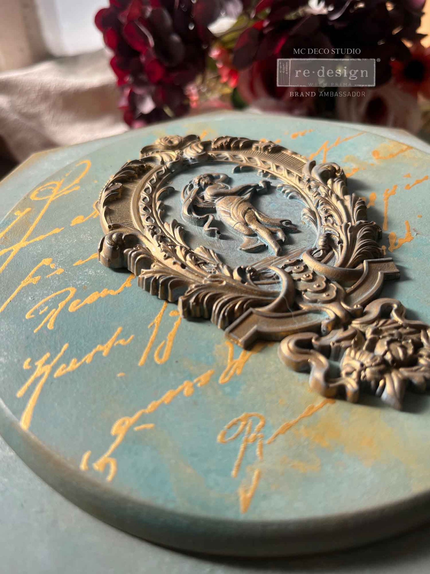 Salon De La Paix decor mould used on furniture surface showing ornate French style embellishment applied to cabinet or drawer front