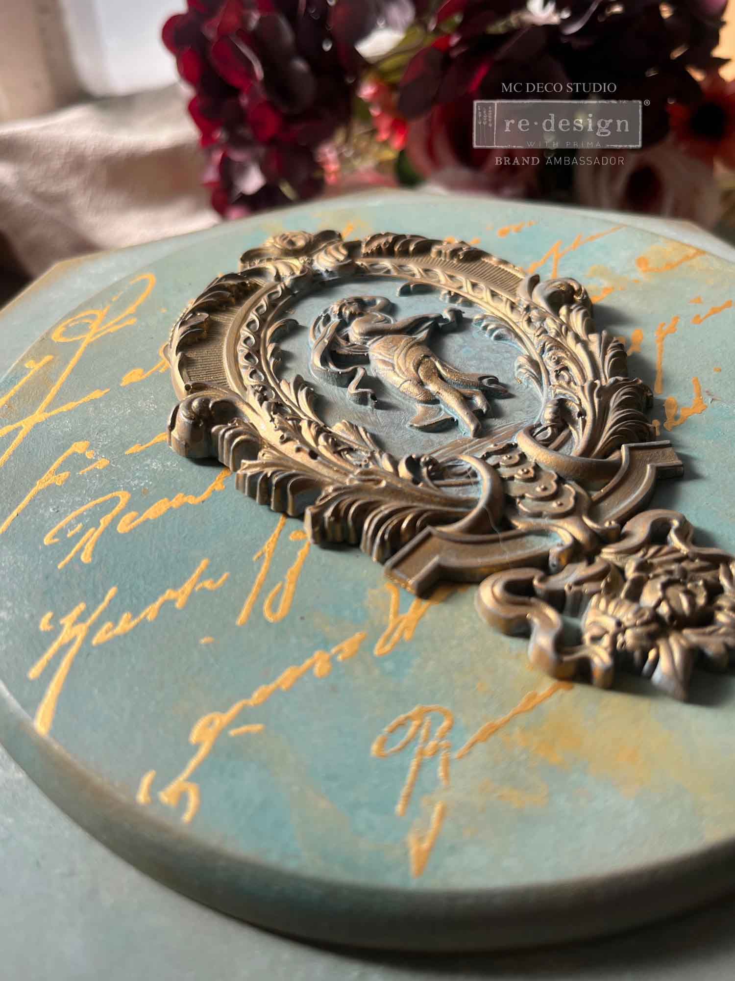 Salon De La Paix decor mould used on furniture surface showing ornate French style embellishment applied to cabinet or drawer front