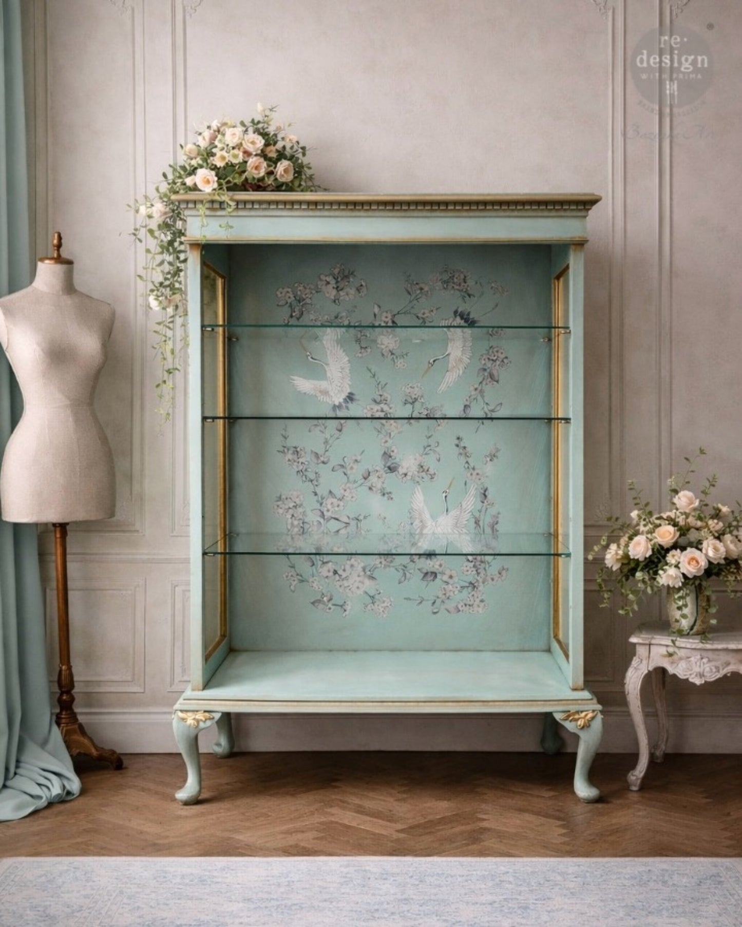 Soft grey botanical furniture transfer with white blossoms and elegant cranes on cabinet backing