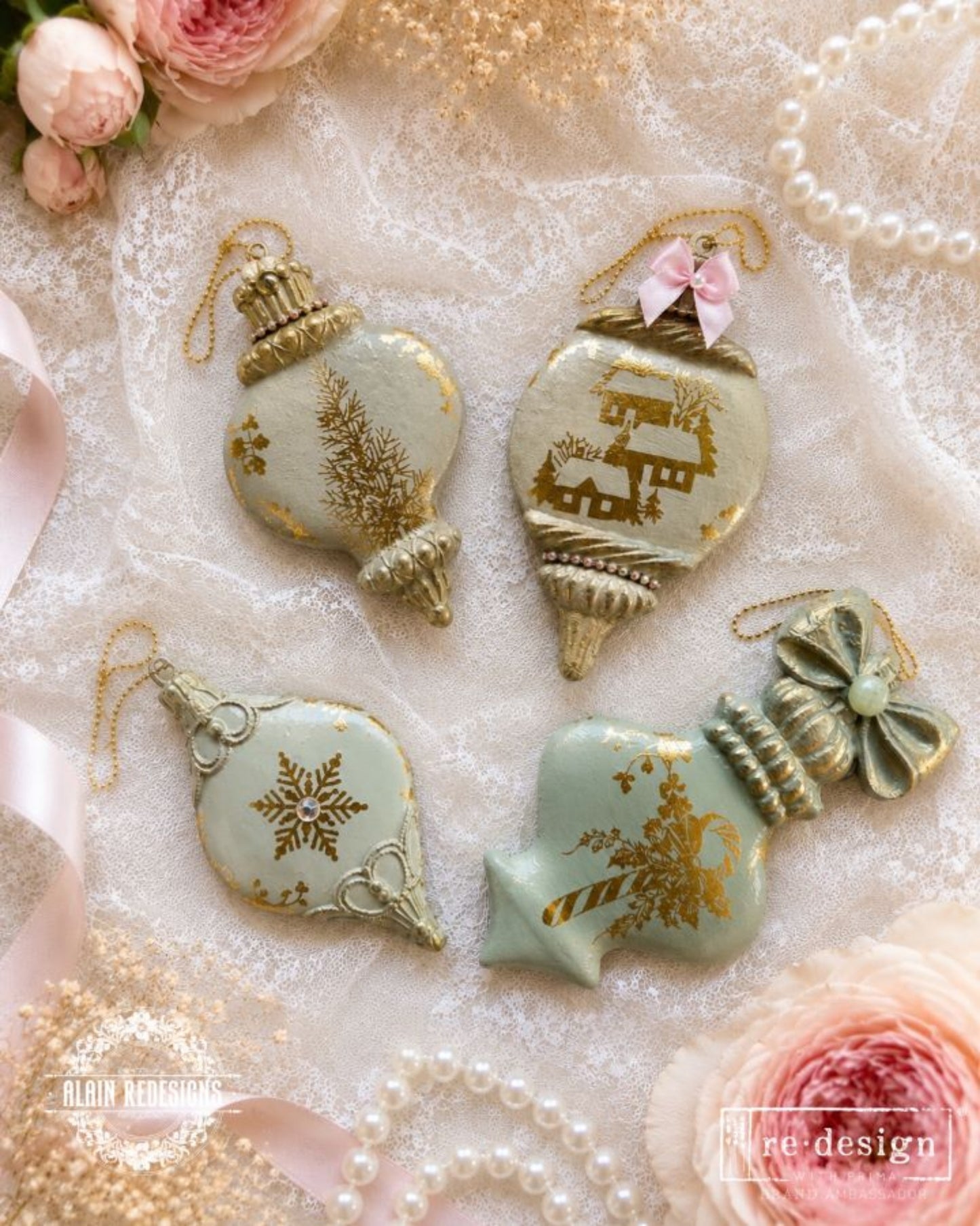 Rustic framed display featuring cast Winter Luxe Blanks ornaments hanging beside a vintage clock, decorative gnome, and taper candles.