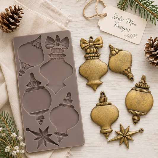 Product image showing the Winter Luxe Blanks mould designs and five finished ornament shapes in an antique gold finish.
