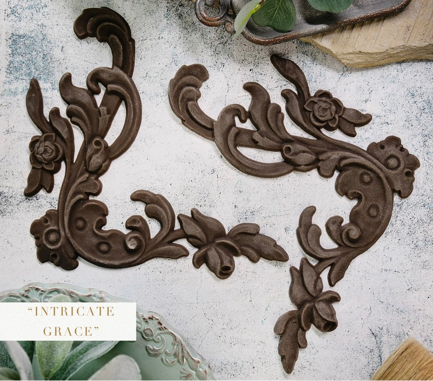 Intricate Grace Décor Poly® set featuring two ornate floral scroll appliqués with elegant curved details, ideal for furniture makeovers, cabinets, frames, and vintage-inspired décor.