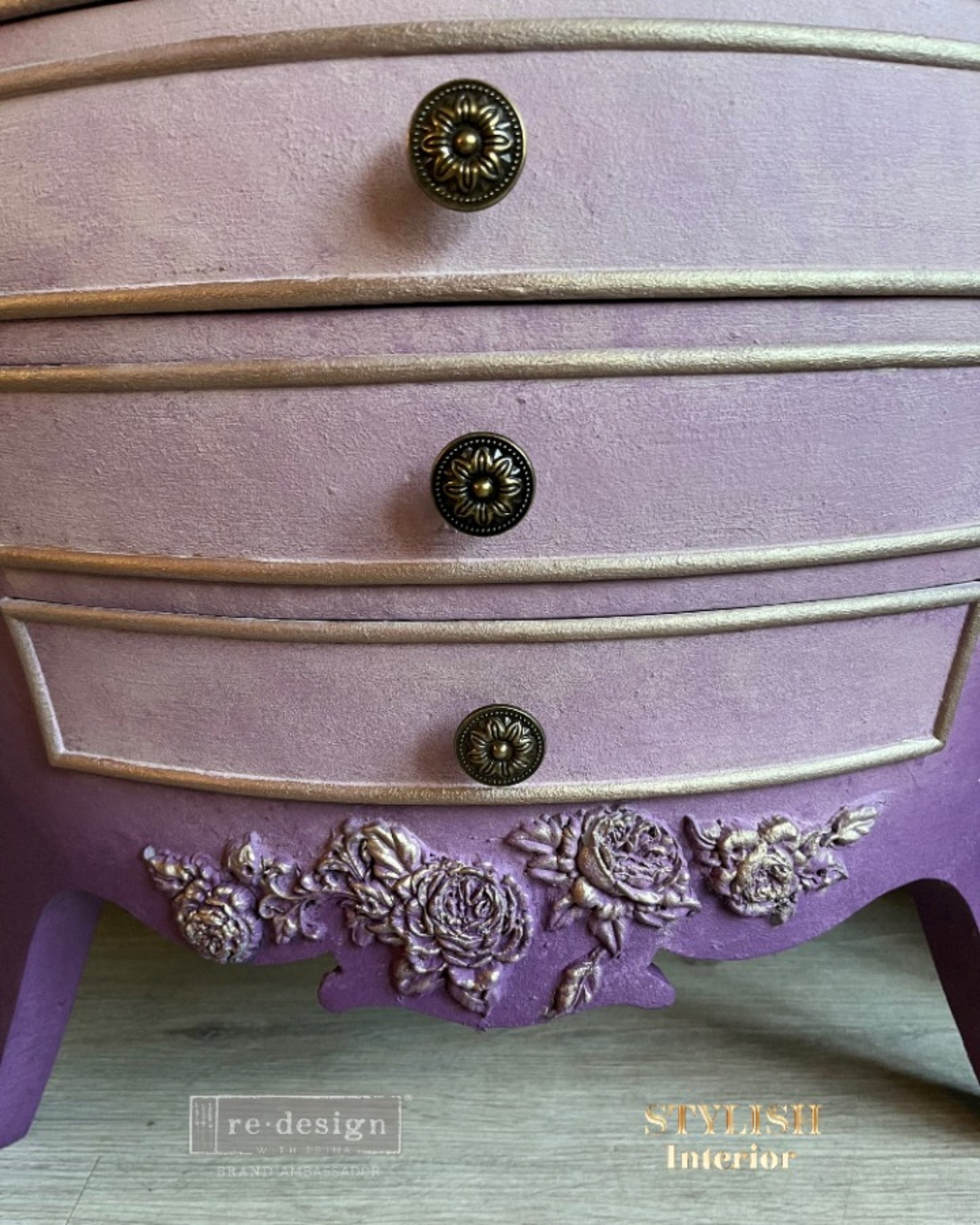 Rosewood Romance Decor Mould showing raised rose blossoms on a nightstand close up