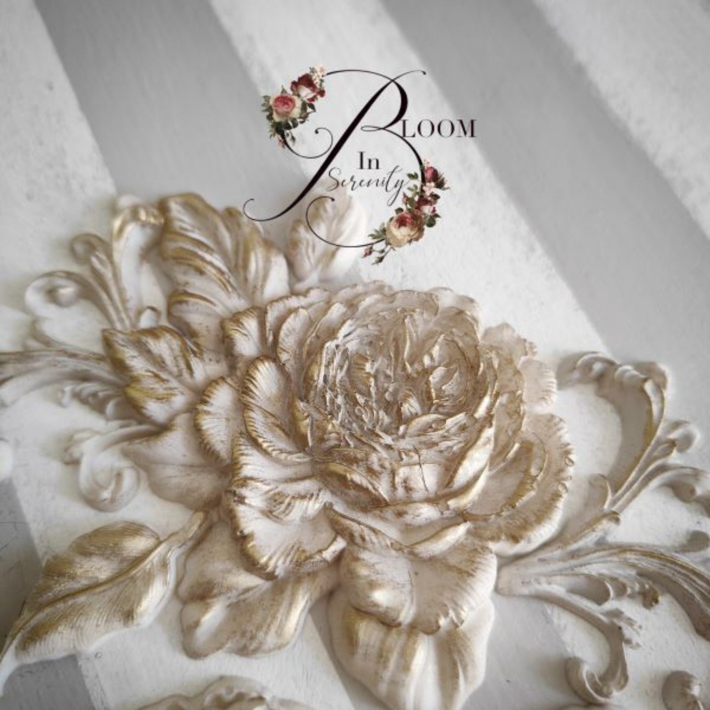 Close-up of Rosewood Romance silicone mould showing detailed rose petals, buds, leaves, and raised floral texture.